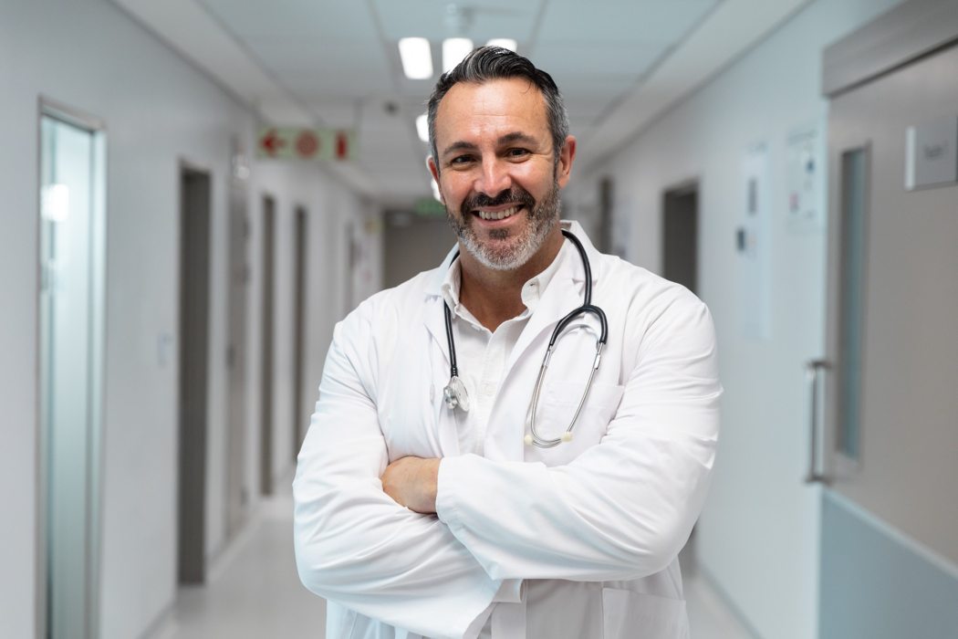 Smiling healthcare professional at Syed Dental Care